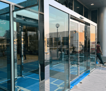 Glass room with the steel cladding with auto door 1 350x300 1